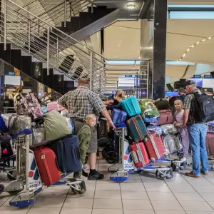 White South Africans Granted Refugee Status by Trump Leave for U.S.
